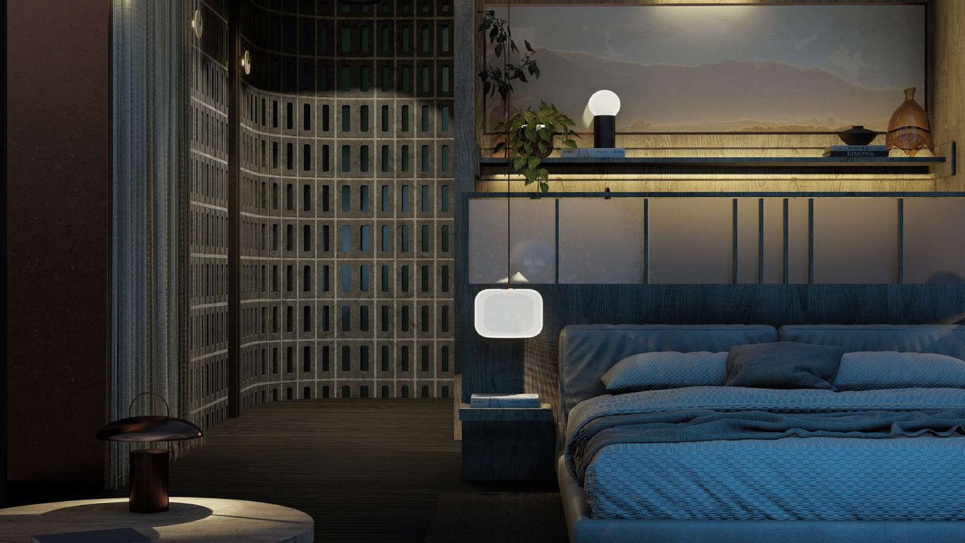 Habitación de villa Awita con celosía de bloque de vidrio y ropa de cama azul.